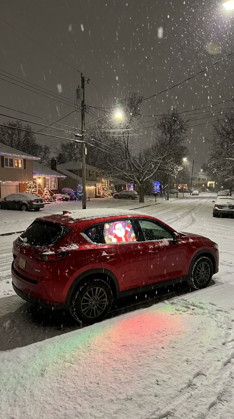 Car glowing on a snowy night